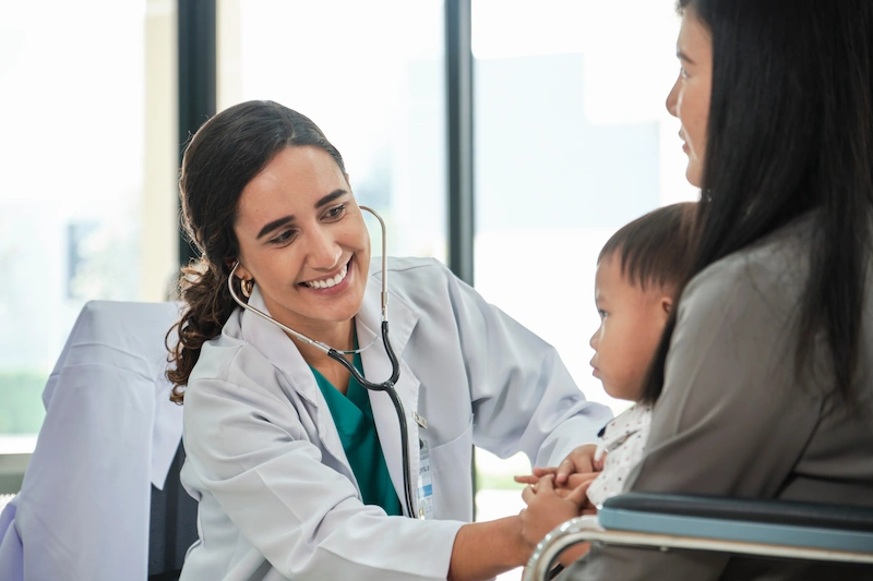 VACIR clinics Young female doctor treating a child