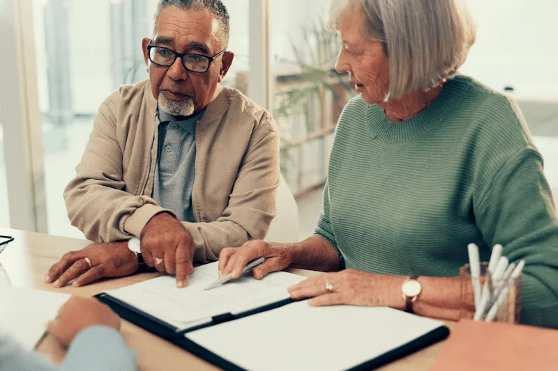 VACIR legal providers Couple looking over legal paperwork